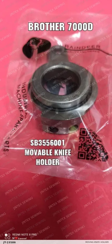Brother 7000D Moving Knife Holder SB3556001 — Part No. JT-23586 sewing machine spare part, photo 2