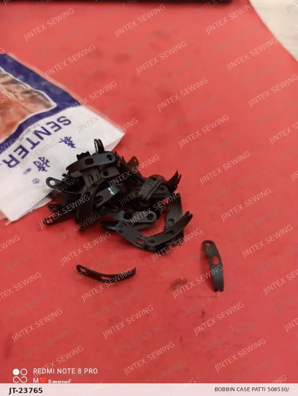 Brother 457 Bobbin Case Patti 508530/ S09477001 — Part No. JT-23765 sewing machine spare part, photo 2